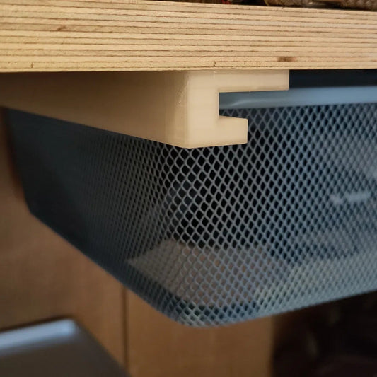 Black 3D printed modular rails for mounting IKEA Trofast bins under a desk