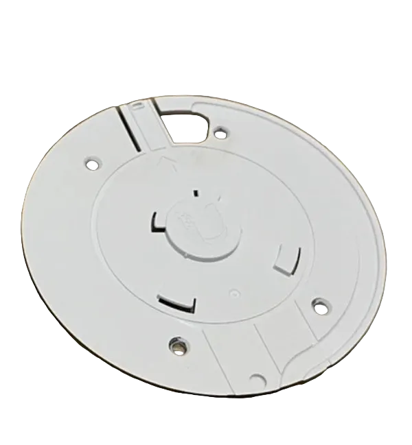 White security camera and mounting bracket on a wooden surface