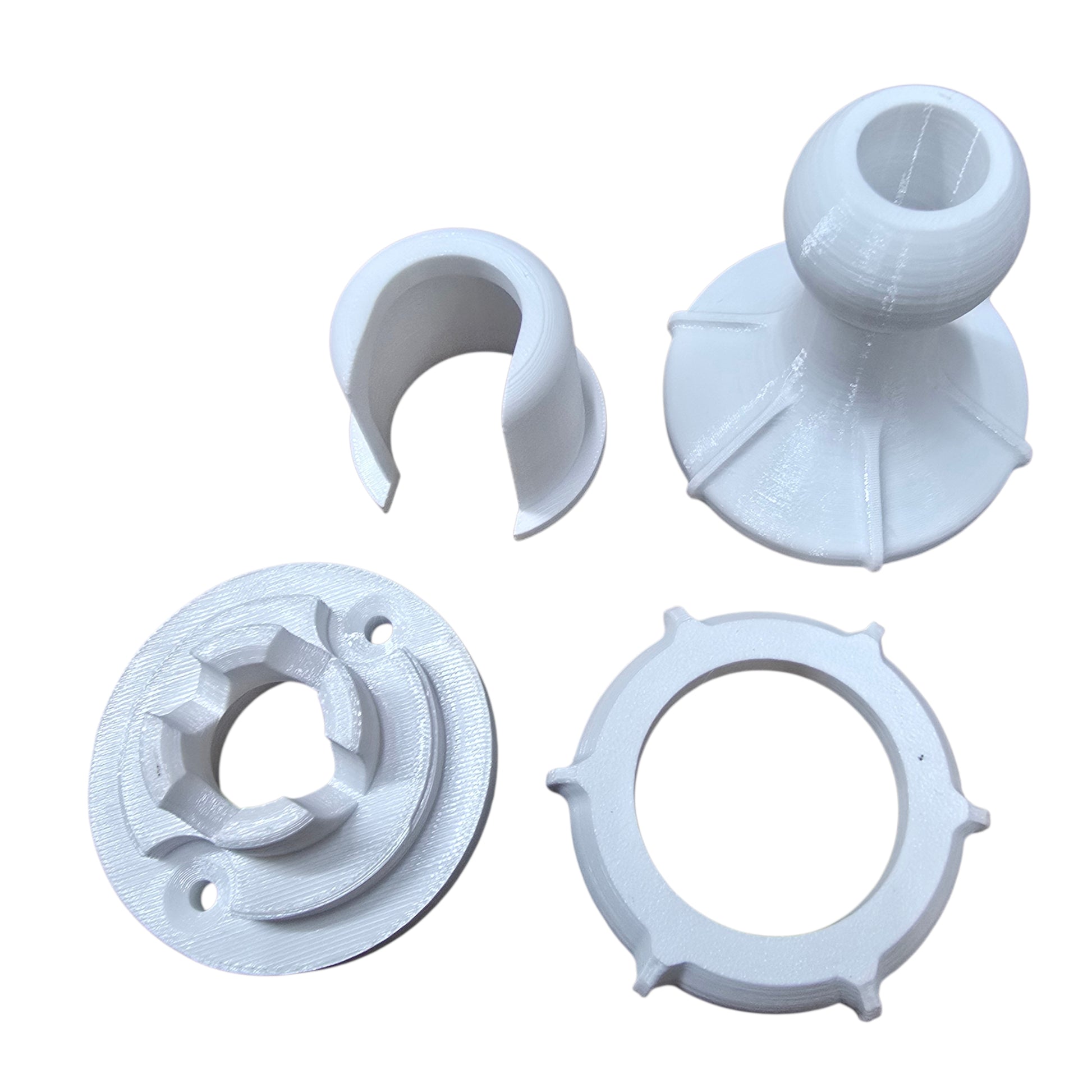 Set of white plastic components on a white background