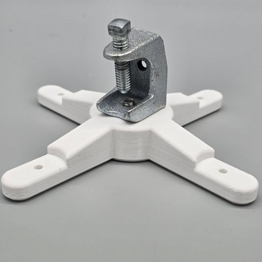 White plastic clamp with metal component on a gray background