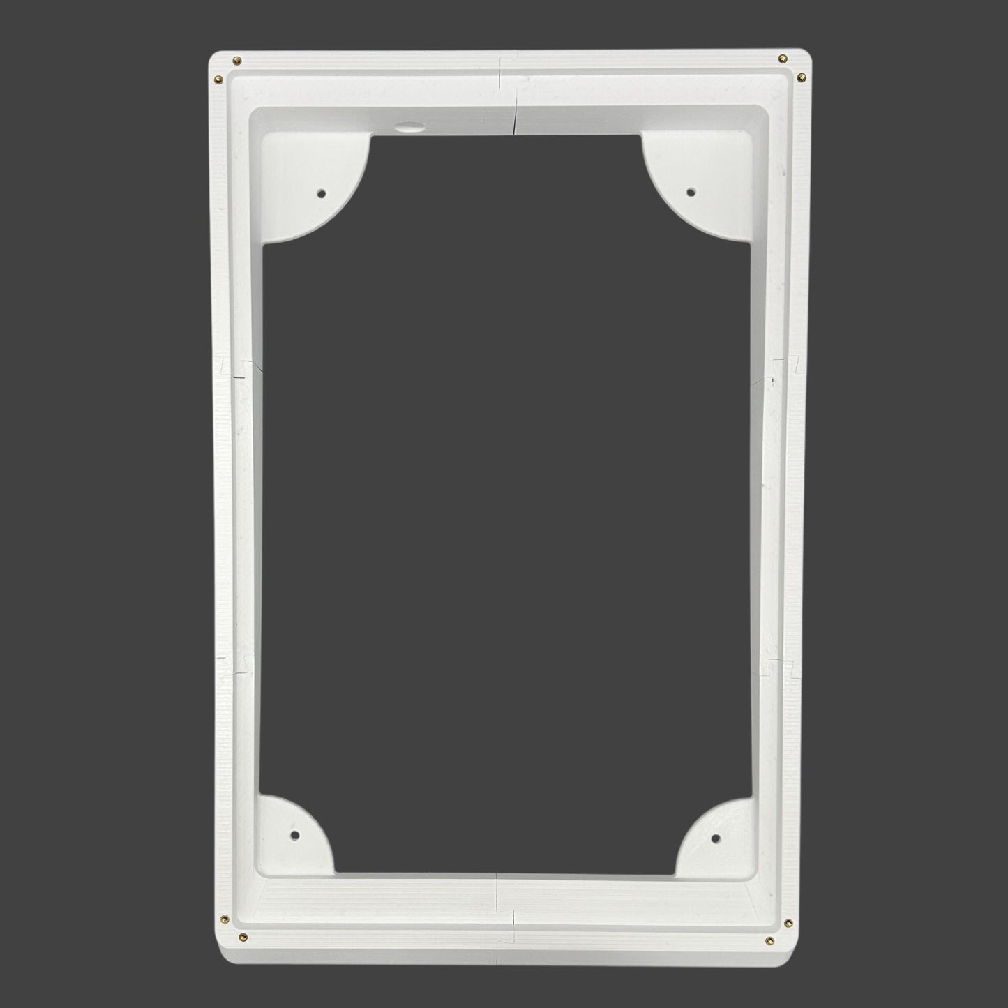 White rectangular frame with rounded corners on a black background